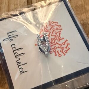 Wishbone silver with gem accents
Keep collective charm